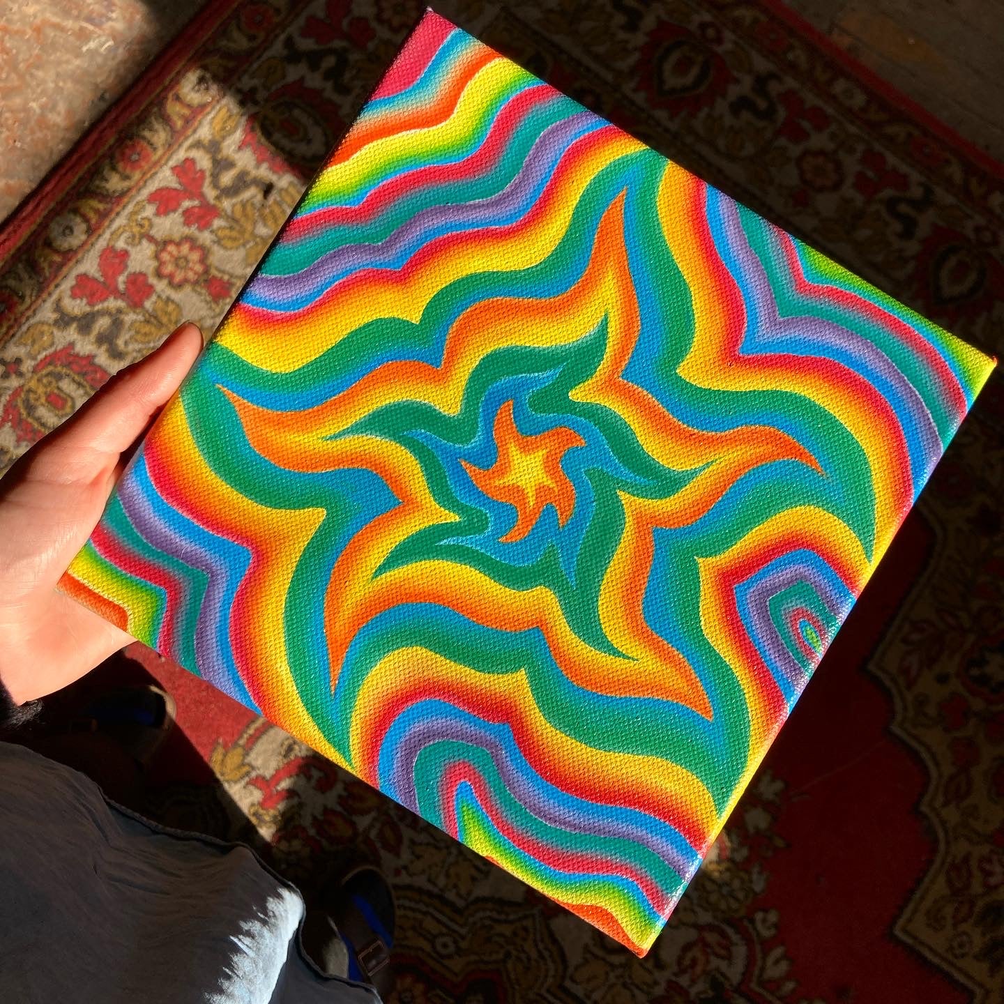"Expanding Rainbow Star" painting